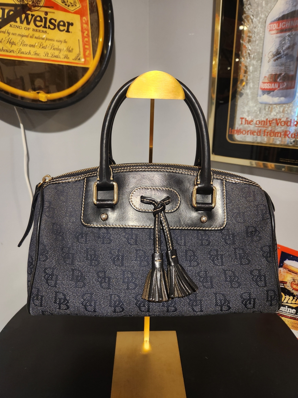 Dooney & Bourke monogrammed domed tassel satchel handbag